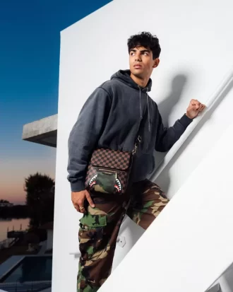 BOLSO BANDOLERA CON CREMALLERA EXTERIOR DORADO SHARKS IN PARIS
