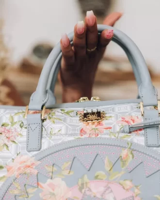 BOLSO DE VIAJE MINI ELEGANT ENERGY DE INTELIGENCIA AFRICANA – COLABORACIÓN CON FLORES DE ARENA
