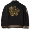 Chaqueta universitaria A.I.9 African Intelligence con leopardo dorado y flor de arena (colaboración)