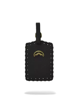 ETIQUETA DE EQUIPAJE CON BOCA DE TIBURÓN SPRAYGROUND