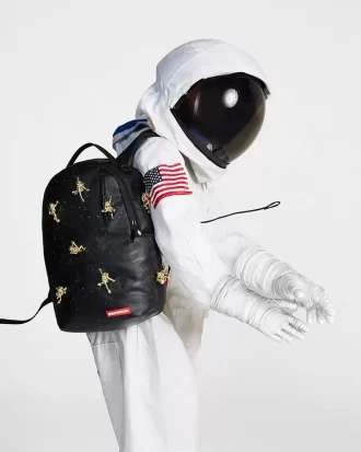 LA MOCHILA DE PERDIDOS EN EL ESPACIO (10 ASTRONAUTAS 3D DE METAL DORADO)