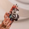 Llavero de oso con pasamontañas de panda