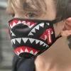 MASCARILLA INFANTIL CON ESTAMPADO DE BOCA DE TIBURÓN (AJUSTE CLÁSICO) MASCARILLA INFANTIL CON ESTAMPADO DE BOCA DE TIBURÓN (AJUSTE CLÁSICO)