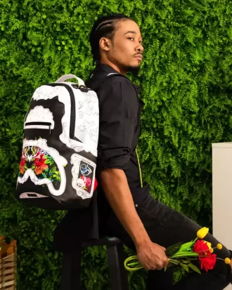 MOCHILA CON CORTE FLORAL (DLXV)