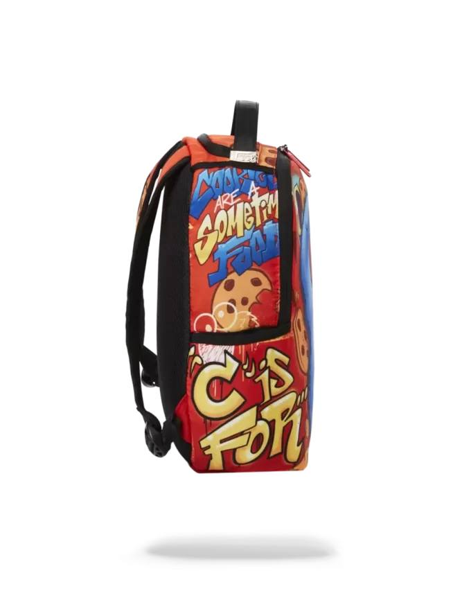 Mochila pequeña del Monstruo de las Galletas a la fuga