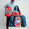 Mochila saltarina de los Pitufos con forma de tiburón Mochila saltarina de los Pitufos con forma de tiburón