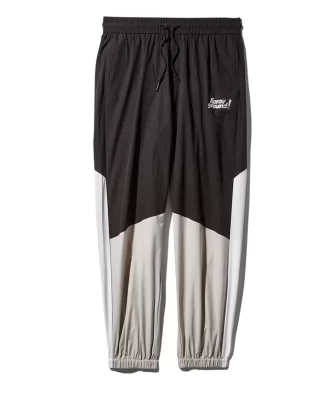 PANTALONES CORTAVIENTOS COLORBLOCK