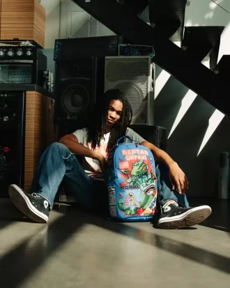PREMIO REPTAR DENTRO DE LA MOCHILA DLXSR